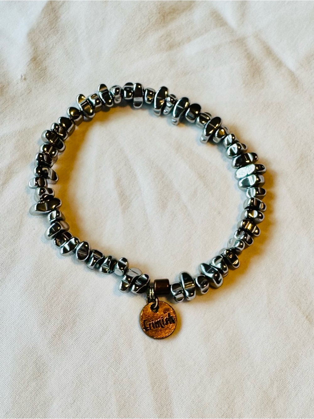 Erimish Hematite Beaded Stretch Bracelet with Bronze Charm